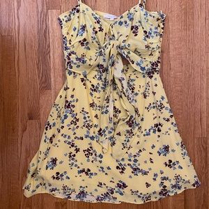 Yellow mini cut out floral dress adjustable straps side zipper closure